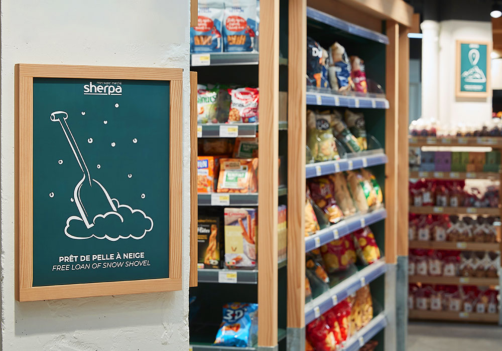 Photo des pictogrammes illustrés dans un supermarché Sherpa